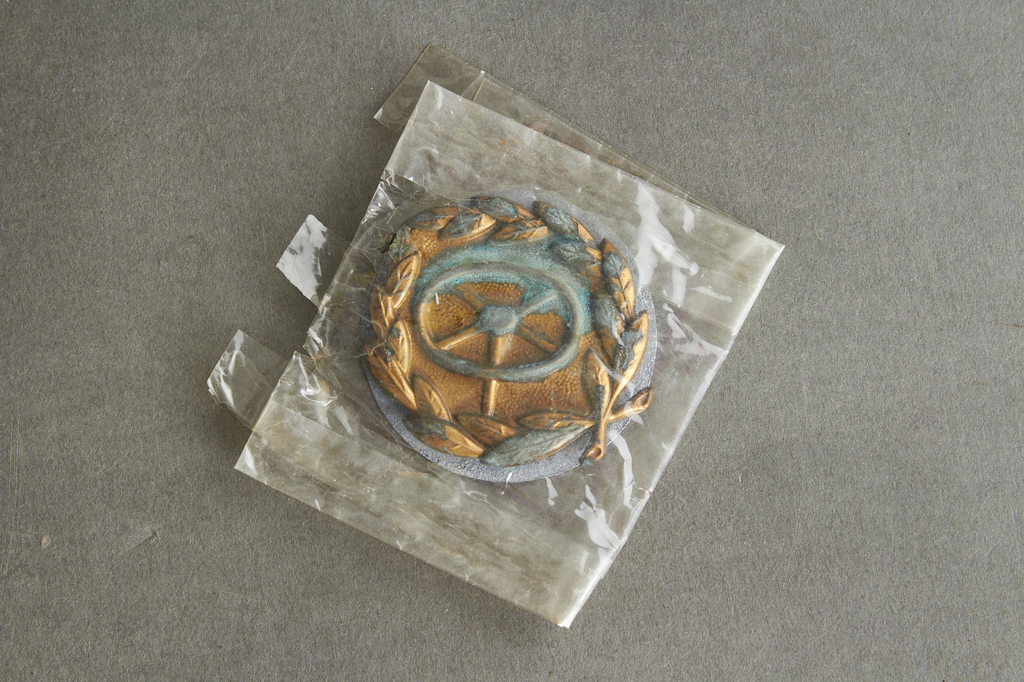Drivers Badge "Kraftfahrbewährungsabzeichen in Bronze". In LDO Zelluloid Bag. Original.