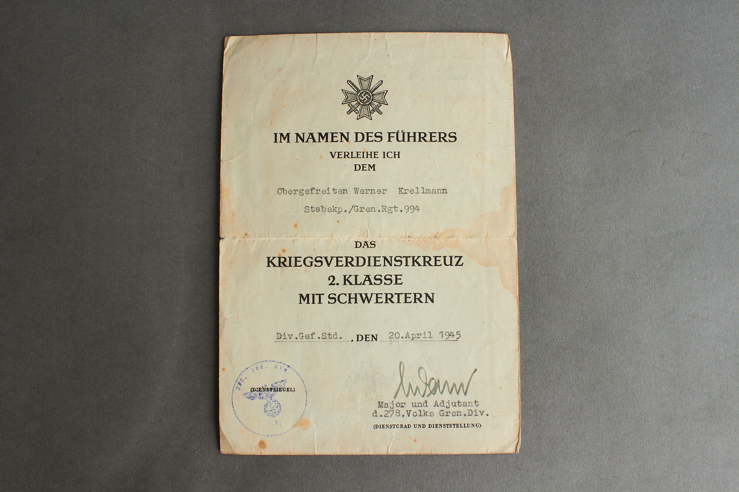 Awarded on Hitlers birthday 20th of april 1945. "Kriegsverdienstkreuz 2. Klasse" w. Swords Urkunde. Original.