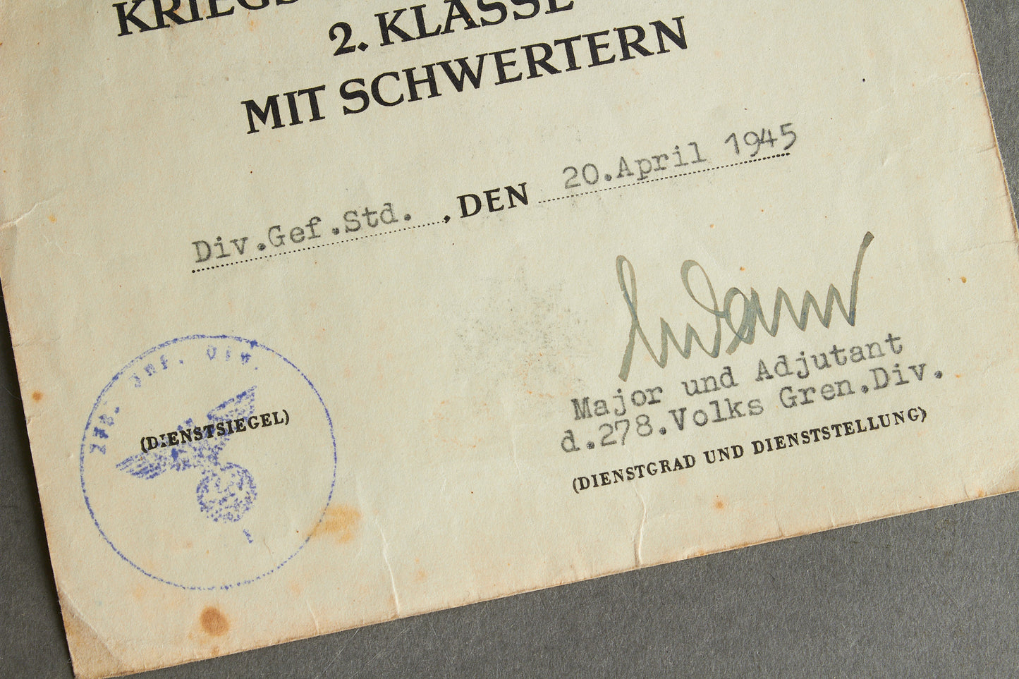 Awarded on Hitlers birthday 20th of april 1945. "Kriegsverdienstkreuz 2. Klasse" w. Swords Urkunde. Original.