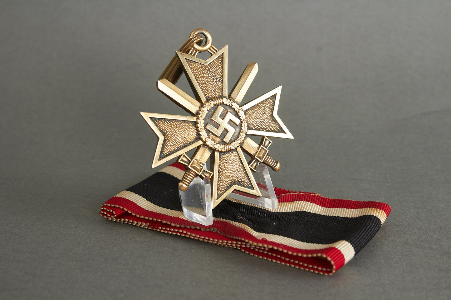 Souval made (after '45) Ritterkreuz des Kriegsverdienstkreuz in real silver. Original Ribbon. Good substitute for a wartime made!