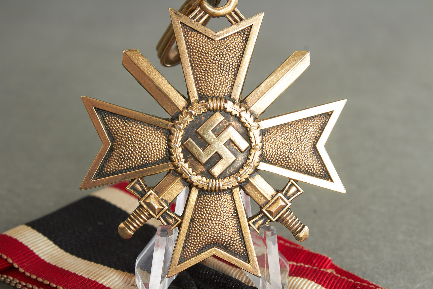 Souval made (after '45) Ritterkreuz des Kriegsverdienstkreuz in real silver. Original Ribbon. Good substitute for a wartime made!