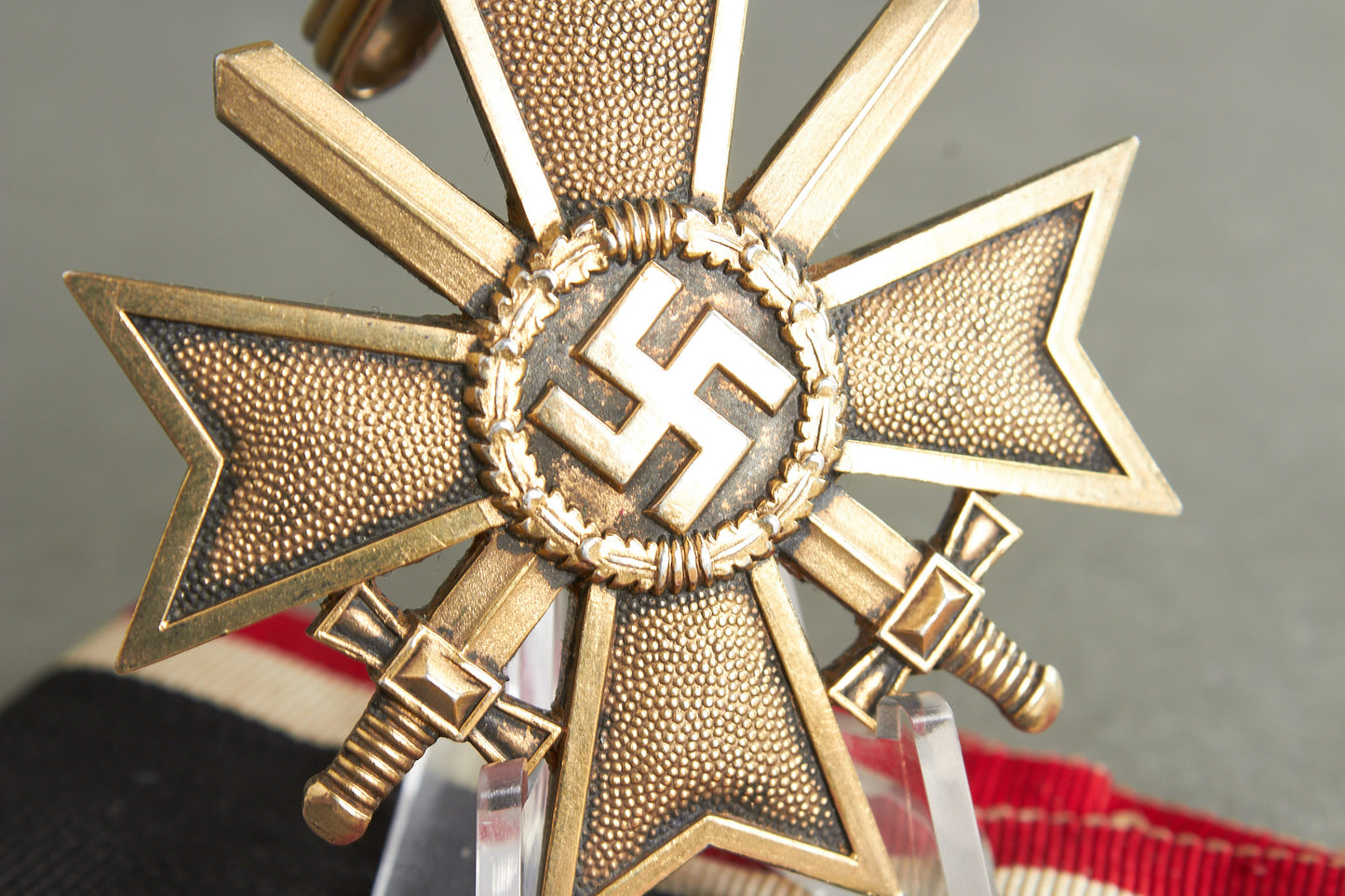 Souval made (after '45) Ritterkreuz des Kriegsverdienstkreuz in real silver. Original Ribbon. Good substitute for a wartime made!