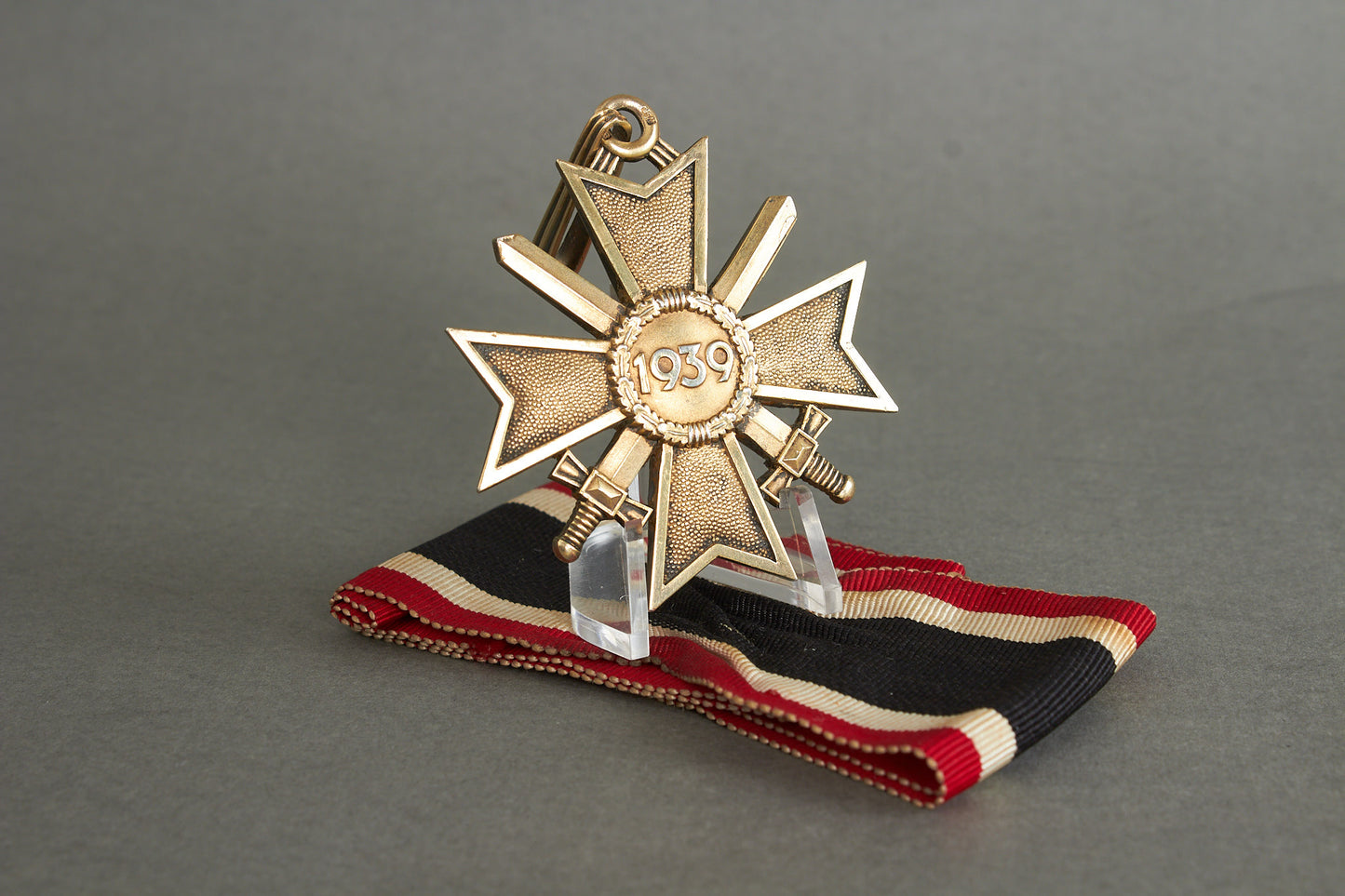 Souval made (after '45) Ritterkreuz des Kriegsverdienstkreuz in real silver. Original Ribbon. Good substitute for a wartime made!