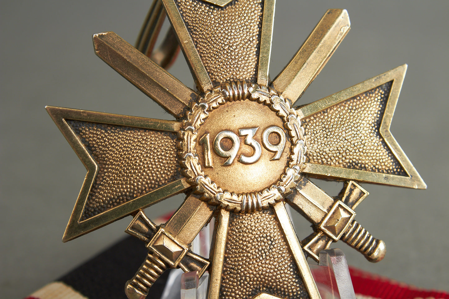 Souval made (after '45) Ritterkreuz des Kriegsverdienstkreuz in real silver. Original Ribbon. Good substitute for a wartime made!