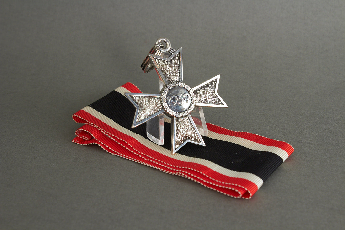 Souval made (after '45) Ritterkreuz des Kriegsverdienstkreuz in real silver. Original Ribbon. Good substitute for a wartime made!