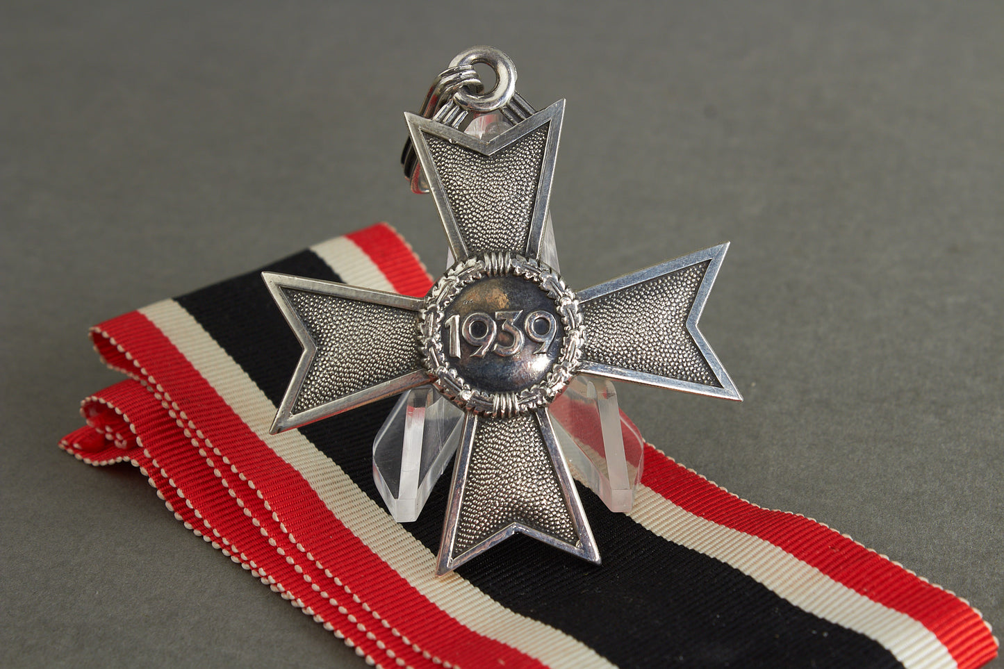 Souval made (after '45) Ritterkreuz des Kriegsverdienstkreuz in real silver. Original Ribbon. Good substitute for a wartime made!