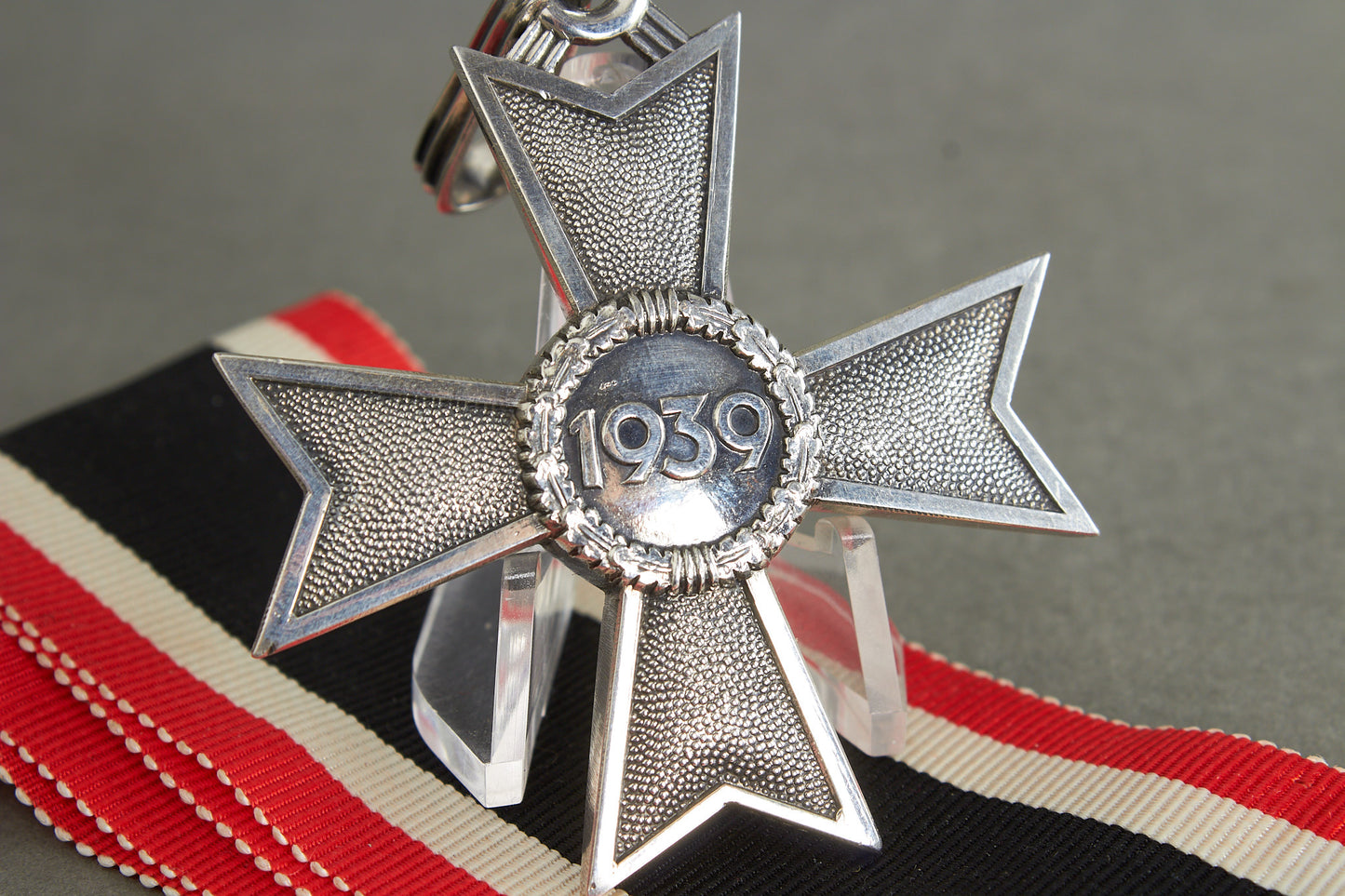 Souval made (after '45) Ritterkreuz des Kriegsverdienstkreuz in real silver. Original Ribbon. Good substitute for a wartime made!