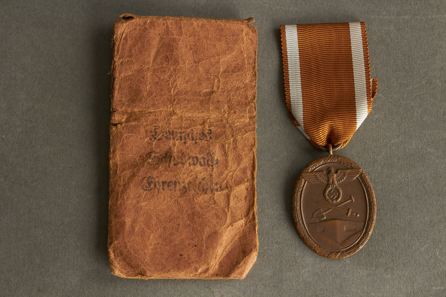 RESERVED "Deutsches Schutzwall Ehrenzeichen". In envelope. Original.