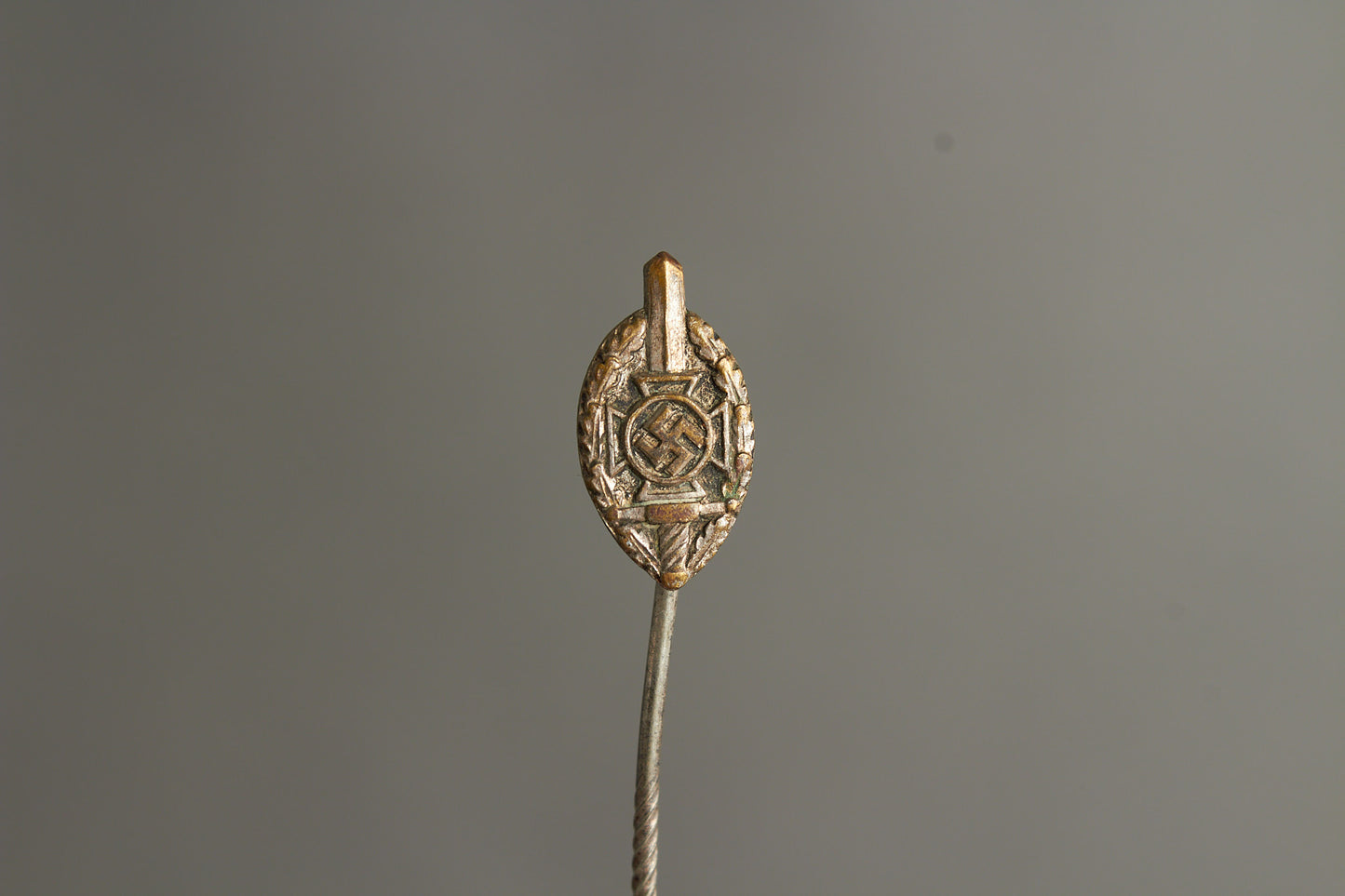 NSKOV (Nationalsozialistische Kriegsopferversorgung) Member pin. Maker marked "RZM 52". Original.