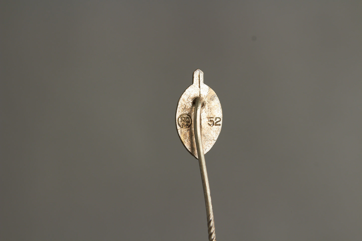 NSKOV (Nationalsozialistische Kriegsopferversorgung) Member pin. Maker marked "RZM 52". Original.
