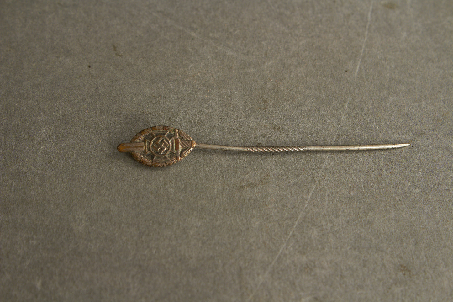 NSKOV (Nationalsozialistische Kriegsopferversorgung) Member pin. Maker marked "RZM 52". Original.