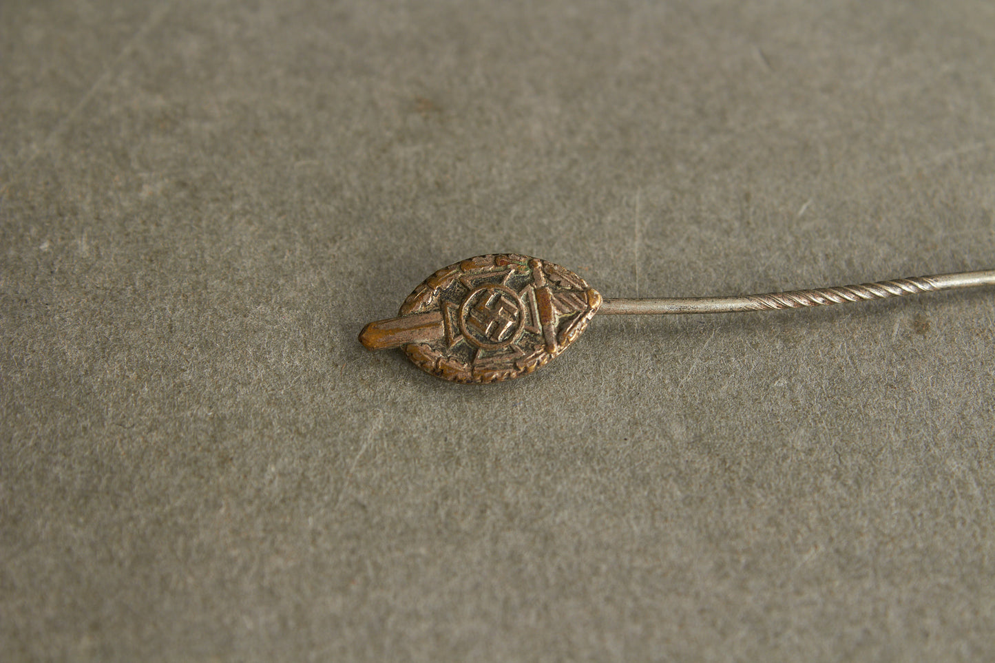 NSKOV (Nationalsozialistische Kriegsopferversorgung) Member pin. Maker marked "RZM 52". Original.