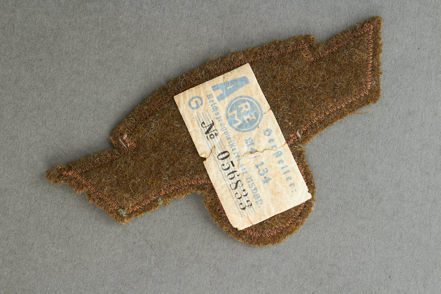 NSKK "Ärmeladler" For the "Braunhemd". With RZM Paper tag. Original.