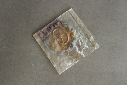 Drivers Badge "Kraftfahrbewährungsabzeichen in Gold". In LDO Zelluloid Bag. Original.