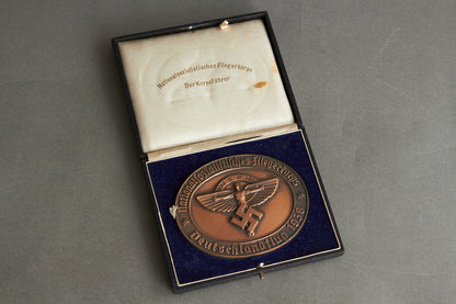 Large NSFK (Nationalsozialistisches Fliegerkorps) "Teilnehmerplakette" from "Deutschlandflug 1938". In box. Original.