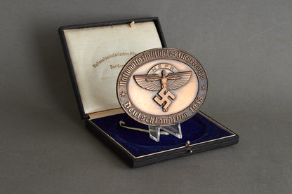 Large NSFK (Nationalsozialistisches Fliegerkorps) "Teilnehmerplakette" from "Deutschlandflug 1938". In box. Original.