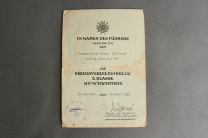 Awarded on Hitlers birthday 20th of april 1945. "Kriegsverdienstkreuz 2. Klasse" w. Swords Urkunde. Original.