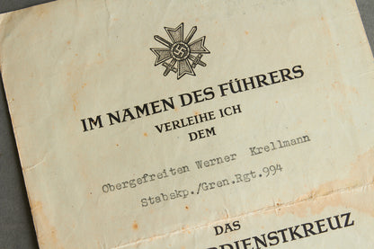 Awarded on Hitlers birthday 20th of april 1945. "Kriegsverdienstkreuz 2. Klasse" w. Swords Urkunde. Original.