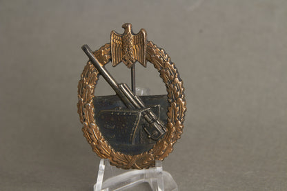 Kriegsmarine "Marine-Artillerie Kriegsabzeichen". Maker marked "Wiedmann". (hard to find maker). Original.