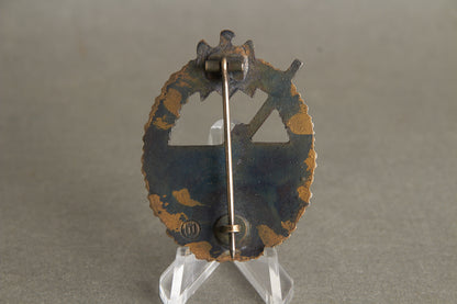 Kriegsmarine "Marine-Artillerie Kriegsabzeichen". Maker marked "Wiedmann". (hard to find maker). Original.