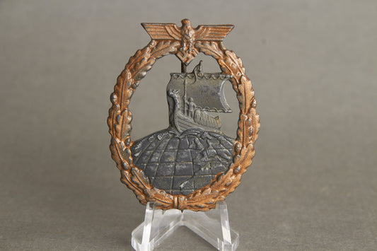 Kriegsmarine "Hilfskreuzer-Kriegsabzeichen". With initials "GK". Period made Rudolf Souval. Original.