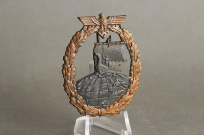 Kriegsmarine "Hilfskreuzer-Kriegsabzeichen". With initials "GK". Period made Rudolf Souval. Original.