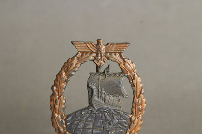 Kriegsmarine "Hilfskreuzer-Kriegsabzeichen". With initials "GK". Period made Rudolf Souval. Original.