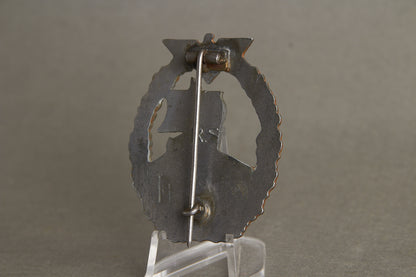 Kriegsmarine "Hilfskreuzer-Kriegsabzeichen". With initials "GK". Period made Rudolf Souval. Original.