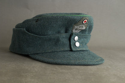 Schutzpolizei "M43 Einheitsfeldmütze" (Mannschaften/Unteroffiziere). Rare. Original.