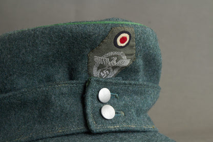 Schutzpolizei "M43 Einheitsfeldmütze" (Mannschaften/Unteroffiziere). Rare. Original.