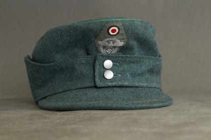 Schutzpolizei "M43 Einheitsfeldmütze" (Mannschaften/Unteroffiziere). Rare. Original.