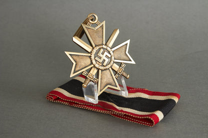 Souval made (after '45) Ritterkreuz des Kriegsverdienstkreuz in real silver. Original Ribbon. Good substitute for a wartime made!