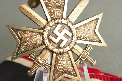 Souval made (after '45) Ritterkreuz des Kriegsverdienstkreuz in real silver. Original Ribbon. Good substitute for a wartime made!