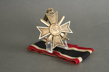 Souval made (after '45) Ritterkreuz des Kriegsverdienstkreuz in real silver. Original Ribbon. Good substitute for a wartime made!
