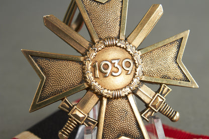 Souval made (after '45) Ritterkreuz des Kriegsverdienstkreuz in real silver. Original Ribbon. Good substitute for a wartime made!