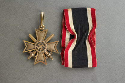 Souval made (after '45) Ritterkreuz des Kriegsverdienstkreuz in real silver. Original Ribbon. Good substitute for a wartime made!