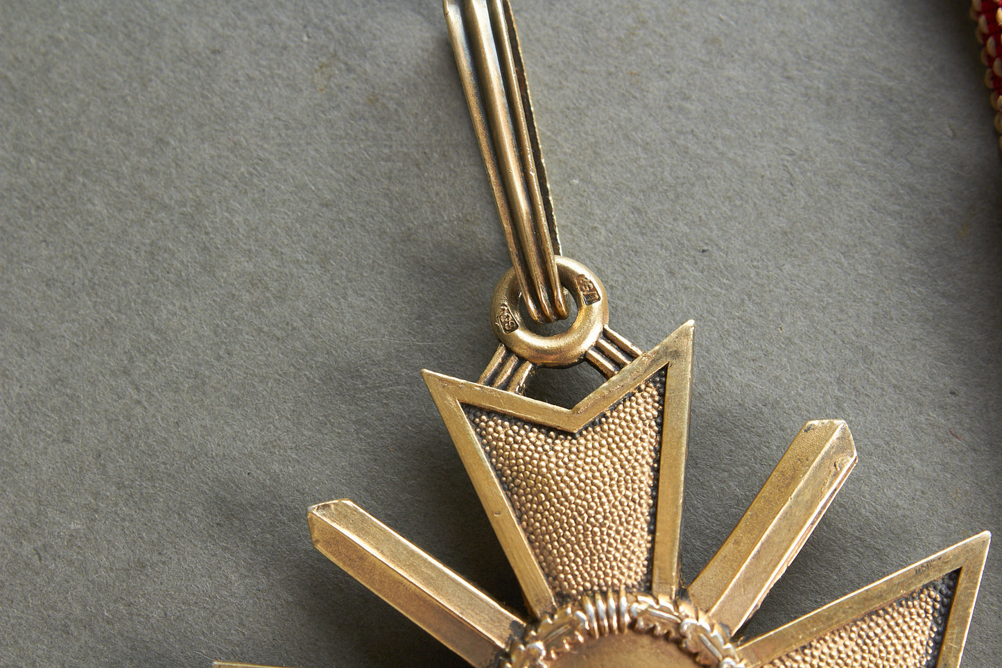 Souval made (after '45) Ritterkreuz des Kriegsverdienstkreuz in real silver. Original Ribbon. Good substitute for a wartime made!