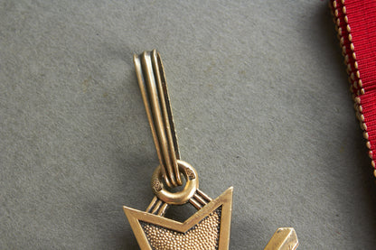 Souval made (after '45) Ritterkreuz des Kriegsverdienstkreuz in real silver. Original Ribbon. Good substitute for a wartime made!