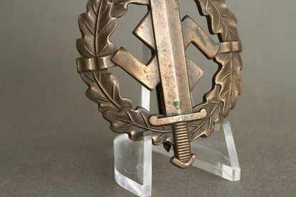 Numbered "SA-Sportabzeichen" in Bronze with miniature. 2. Model (1935-1938). Original.