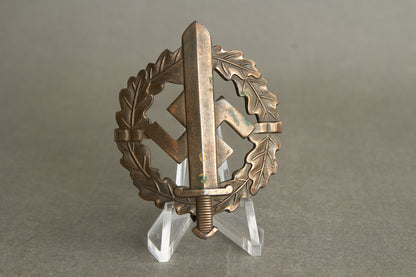 Numbered "SA-Sportabzeichen" in Bronze with miniature. 2. Model (1935-1938). Original.