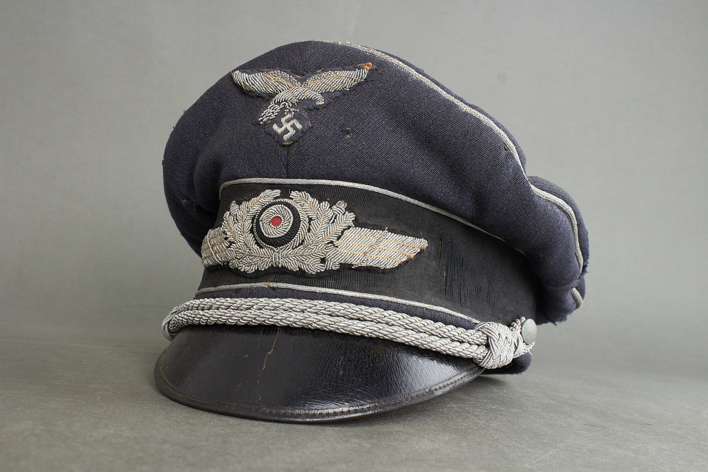 Early "Droptail" Luftwaffe Officer Visor Cap. Original.
