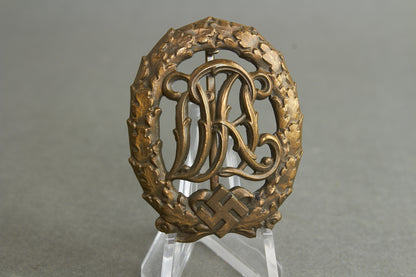 "Reichssportabzeichen DRL" in Bronze. Original.