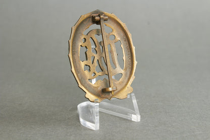 "Reichssportabzeichen DRL" in Bronze. Original.