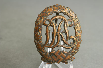 "Reichssportabzeichen DRL" in Bronze. Original.