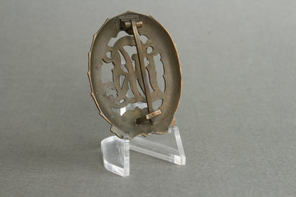 "Reichssportabzeichen DRL" in Bronze. Original.