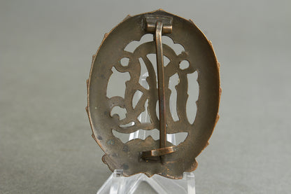 "Reichssportabzeichen DRL" in Bronze. Original.