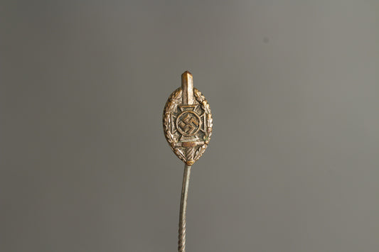 NSKOV (Nationalsozialistische Kriegsopferversorgung) Member pin. Maker marked "RZM 52". Original.
