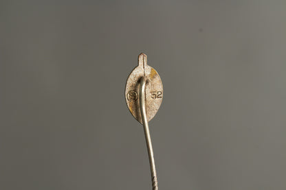 NSKOV (Nationalsozialistische Kriegsopferversorgung) Member pin. Maker marked "RZM 52". Original.