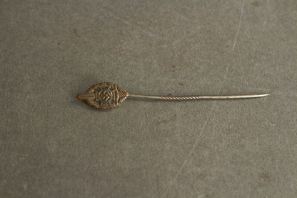 NSKOV (Nationalsozialistische Kriegsopferversorgung) Member pin. Maker marked "RZM 52". Original.