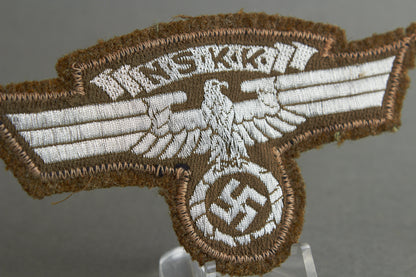 NSKK "Ärmeladler" For the "Braunhemd". With RZM Paper tag. Original.